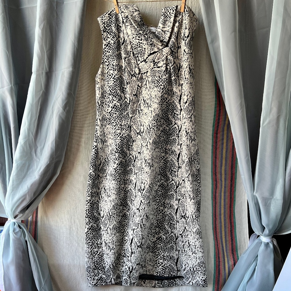 Calvin Klein sleeveless shawl collar with button
